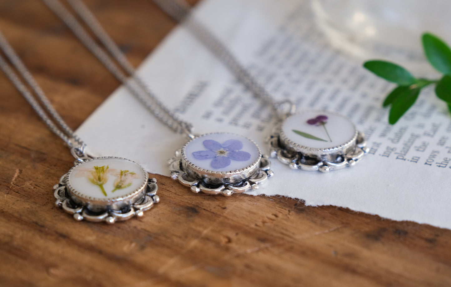 Ornate Scalloped Edge Pressed Flower Necklace with White Background