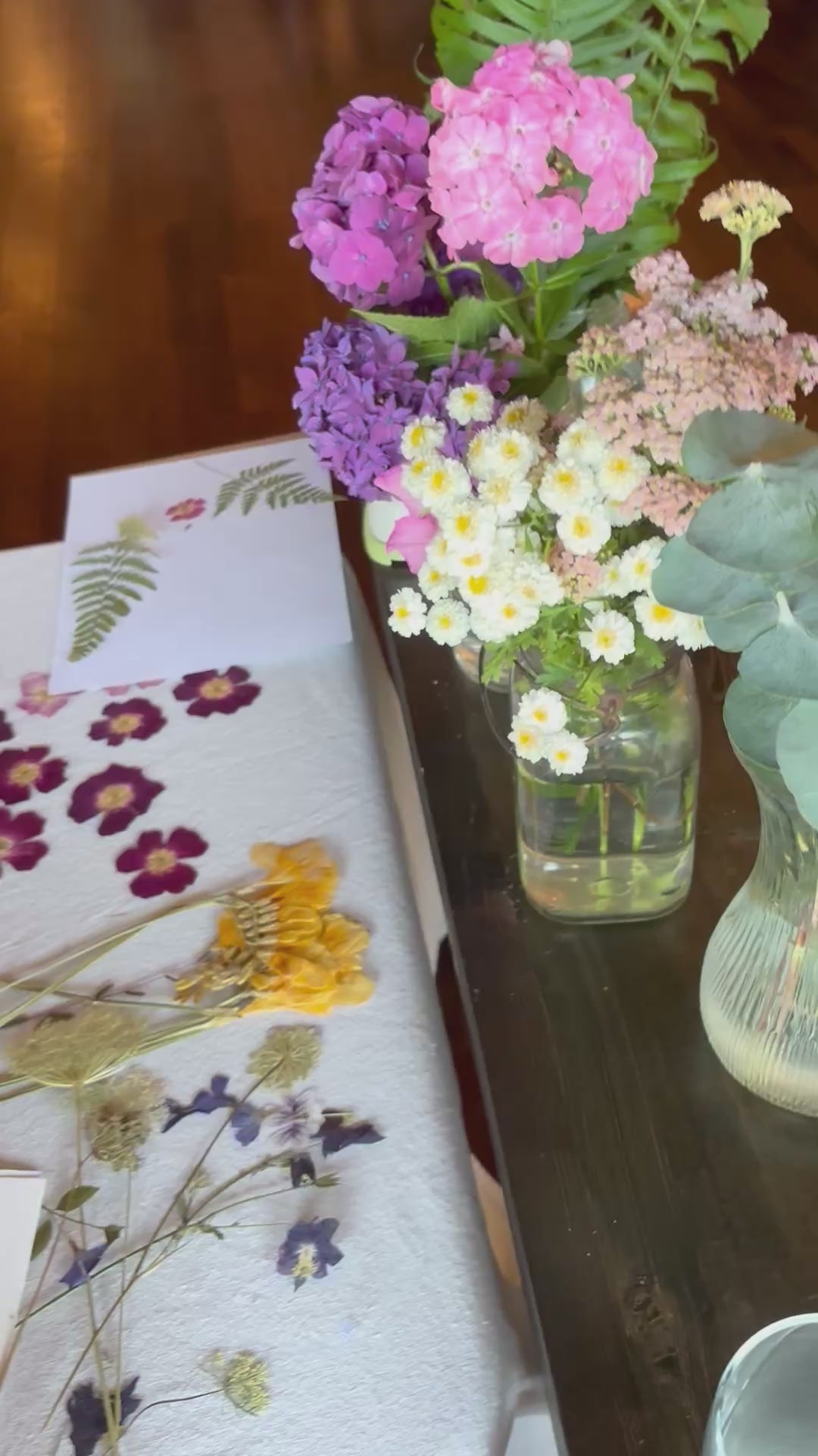 overview of people working at a pressed flower workshop
